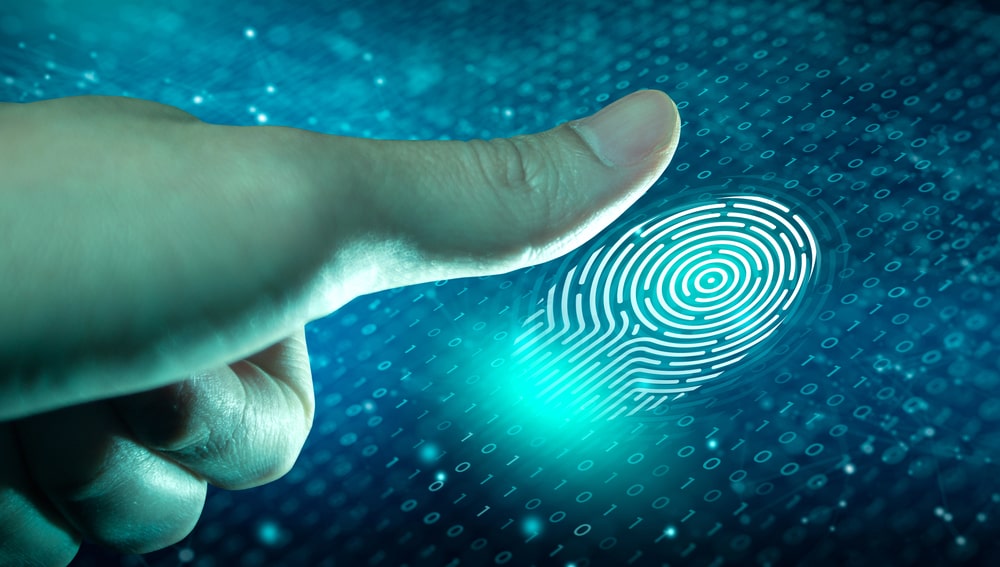 Image is of a digital fingerprint scan on a technology screen, concept of arrest in Clinton and the role of evidence collection during a criminal investigation.
