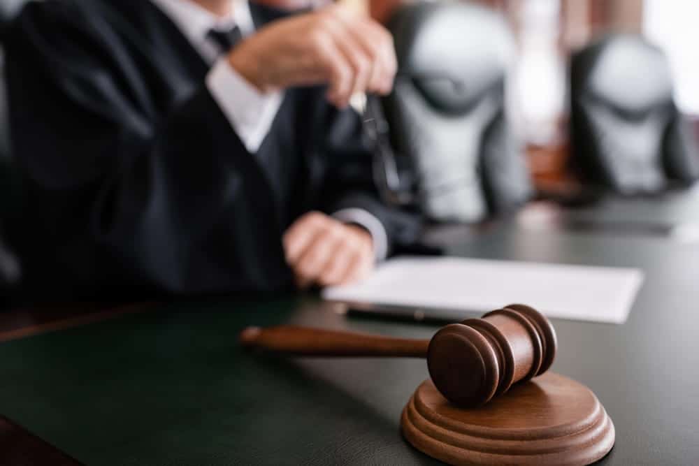 Image is of a judge's gavel in a courtroom, representing legal proceedings involving CDL holders in Tennessee after a DUI charge.